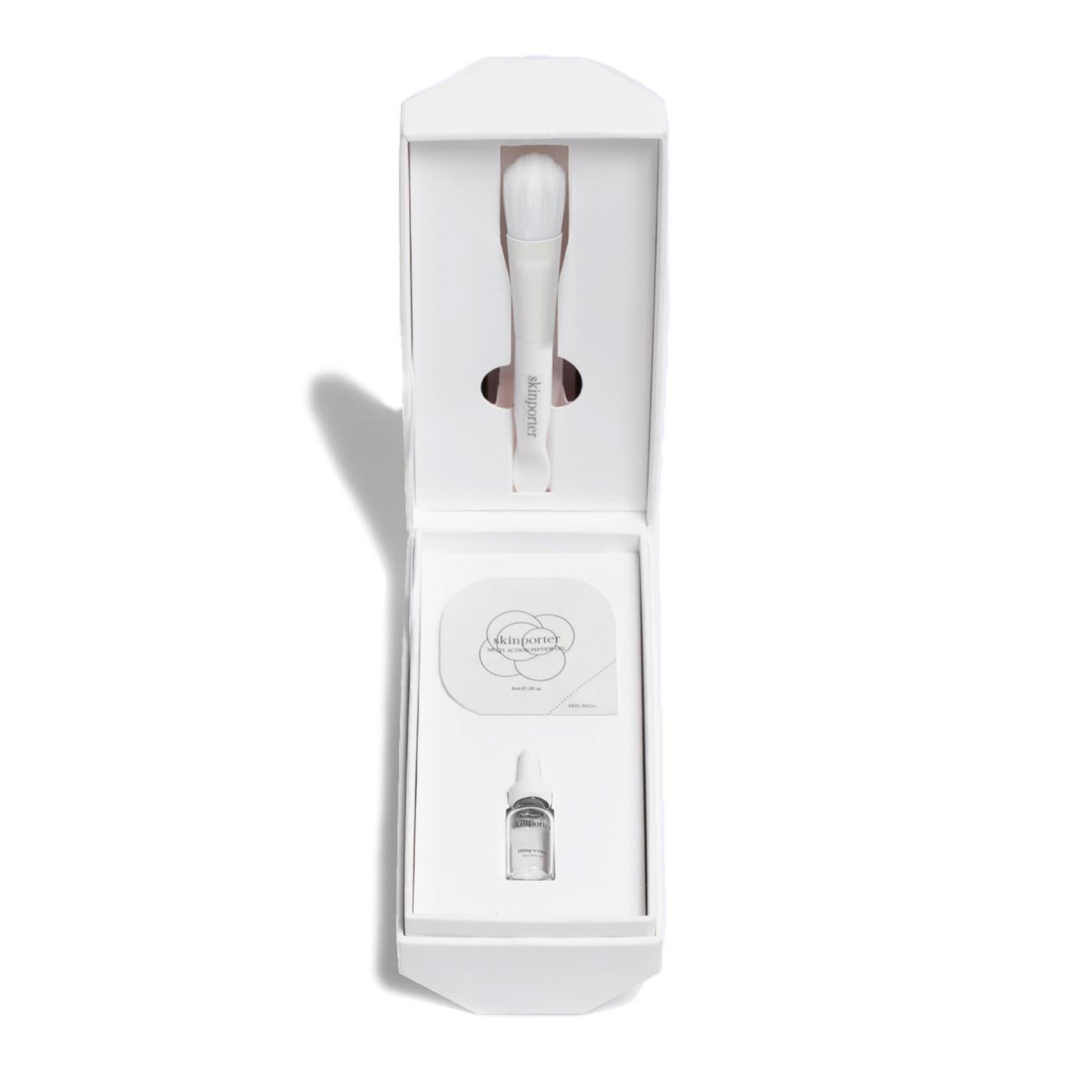 SKINPORTER Skinporter Starter O₂ Peptide Facial with skincare products and tools on a clean white background