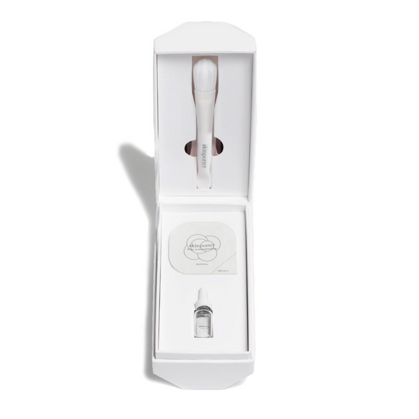 skinporter Peptide Facial Starter Octagon open box showing applicator brush, Multi-Action Peptide Gel sachet and Lifting Serum vial