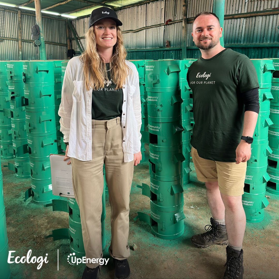 Ecologi and UpEnergy team members on site surrounded by community cookstoves — skinporter plants one tree with every product sold in partnership with Ecologi